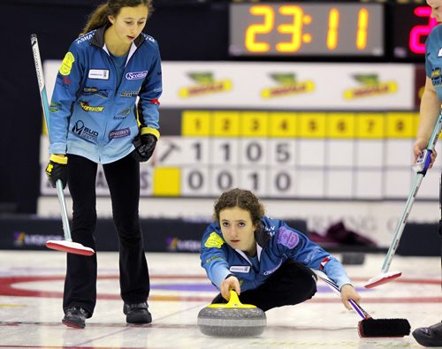 BEAUSEJOUR, MB -Skip Mackenzie Zacharias, right,  and her 14 year old little sister Emily, left,  at the 4:30 draw at Sun Gro Centre for The Scotties Tournament of Hearts Thursday evening. BORIS MINKEVICH / WINNIPEG FREE PRESS January 21, 2016