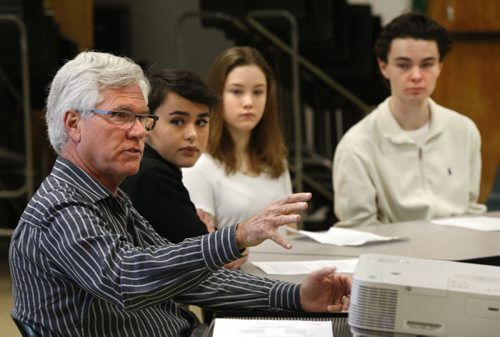 From left, Jim Carr, Canadian Minister of Natural Resources meets with the Kelvin High School Environmental Action Committee members Sila Rogan, Julia Miles and Elijah Dietrich and fellow students to discuss Canadas climate and environmental policy Friday morning.  Bill Redekop story. Wayne Glowacki / Winnipeg Free Press Jan. 22 2016