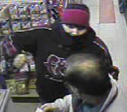 Between January 29th and February 8th, 2008, an armed male entered a number of businesses in the downtown and North end areas of the city where he demanded and received an undisclosed amount of cash and merchandise. police handout winnipeg free press