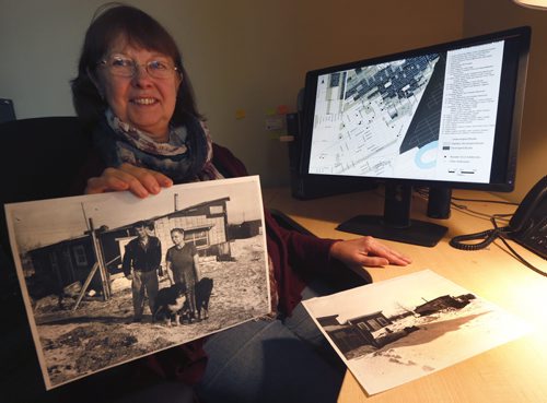 49.8 - Rooster Town. Evelyn Peters, a U of W prof. who's spent last few years researching Rooster Town and its inhabitants, who were mostly Metis and immigrant squatters living in shanties for decades. They were displaced in late 50s to make way for Grant Park shopping mall. She is with photos of  Rooster Town taken in 1950's, in the foreground is a photo Ernest and Elizabeth Stocks by their home. Randy Turner story Wayne Glowacki / Winnipeg Free Press Jan. 22 2016