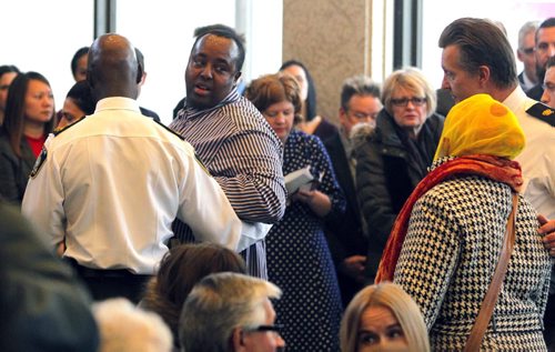 WINNIPEG, MB - Together with individuals and community leaders, Mayor Brian Bowman will reflect on the year following Winnipeg being labeled the most racist city in Winnipeg by Macleans magazine, and will outline further steps to build reconciliation, diversity, and inclusion.The event was briefly interrupted by a tearful Somali mother who told those gathered outside the mayors office that she hadnt seen her three children for six years since child welfare apprehended them. After several moments, after city staff and Ojibway elder Randi Gage tried to calm her and Bowman agreed to meet with her, Winnipeg Police Service Chief Devon Clunis stepped in to lead the woman and her husband, both refugees, away to a nearby room.  BORIS MINKEVICH / WINNIPEG FREE PRESS January 22, 2016