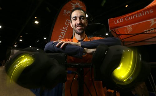 Sinan Leylek, President and CEO of Spark Rentals, a lighting equipment rental company, at his booth at the Wonderful Wedding Show at the Winnipeg Convention Centre, Friday, January 22, 2016. (TREVOR HAGAN/WINNIPEG FREE PRESS)