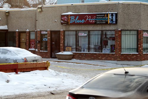 The Parking lot\ iin the 500 block of Sargent at Young Street is taped off by police after a stabbing occurred early Saturday morning outside the Blue Nile Restaurant.    Jan 23, 2016 Ruth Bonneville / Winnipeg Free Press