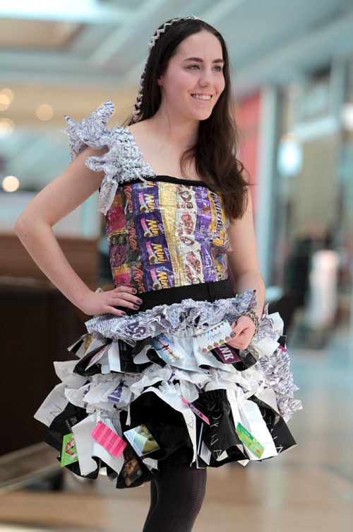 Grade 12 Collège Béliveau student, Kayla Acres, shows off her recycled dress she made out of plastic bags, candy wrappers and used gift cards that she plans on wearing to her grade 12 grad, at the Take Pride Winnipeg and Multi-Material Stewardship Manitoba Fashion Fest Saturday at St. Vital Centre.  Students from across Winnipeg showed off their outfits made out of recycled material as part of a educational program for students by MMSM to bring awareness to fun ways to reuse discarded materials.   Standup photos Jan 23, 2016 Ruth Bonneville / Winnipeg Free Press