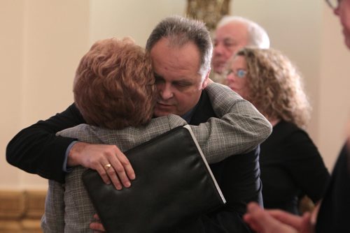Chris Pawley embraces hi mom, Adele Pawley after her reflections on her husbands life, Howard Pawley at the closing a Celebration of the Life service for the former premier of Manitoba Saturday in room 200 at the Legislative Building.   See Alex Paul story. Jan 23, 2016 Ruth Bonneville / Winnipeg Free Press