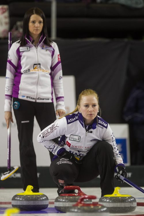 Skip Kerri Einarson (left) watches as Skip Kristy McDonald lines up a rock during the finals of the Scotties Tournament of Hearts in Beausejour, Manitoba, Sunday afternoon. 160124 - Sunday, January 24, 2016 -  MIKE DEAL / WINNIPEG FREE PRESS