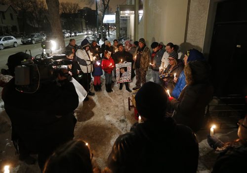 January 24, 2016 - 160124  -  Family and friends of missing woman Claudette Osborne gather for a vigil Sunday, January 24, 2016. Family and friends gathered on Selkirk at King St the last possible location Claudette Osborne was seen July 2008. John Woods / Winnipeg Free Press
