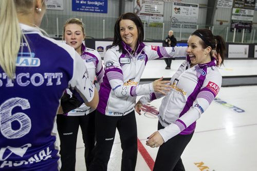 Skip Kerri Einarson (centre) and her team mates Kristin MacCuish (left) and Liz Fyfe (right) react after winning the Scotties Tournament of Hearts against Team McDonald 7-4 in Beausejour, Manitoba, Sunday afternoon. 160124 - Sunday, January 24, 2016 -  MIKE DEAL / WINNIPEG FREE PRESS