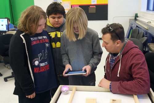 George Waters Middle School 190 Ferry Road in St James- L to R  student, Ethon Verch,Shawn Kemble, and Tye Siemens use Spero robot to learn about coding with teacher Carmen Bonnici - See Nick Martin Story- Jan 25, 2016   (JOE BRYKSA / WINNIPEG FREE PRESS)