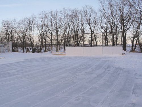 Canstar Community News Paul Karnafel's backyard rink on Gunn Road is mostly used for playing sponge hockey with friends and family. (SHELDON BIRNIE/CANSTAR/THE HERALD)