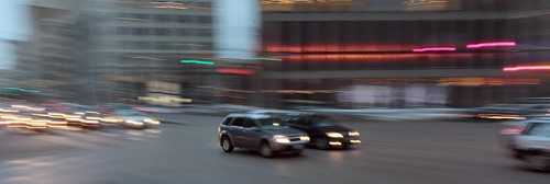Rush hour traffic moves through Portage and Main Monday afternoon.  January 25, 2015 - (Phil Hossack / Winnipeg Free Press)