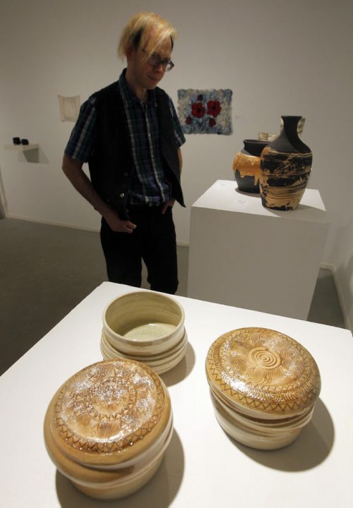 WINNIPEG, MB - ART STANDUP - Michael Joyal checked out some of the crafty art that is showing in the Cre8ery Gallery & Studios. The front art is called Latte Tea Bowls (2015) wood fired porcelain by Brigitta Urben. For the Love of Craft. Manitoba Arts Council. BORIS MINKEVICH / WINNIPEG FREE PRESS January 26, 2016