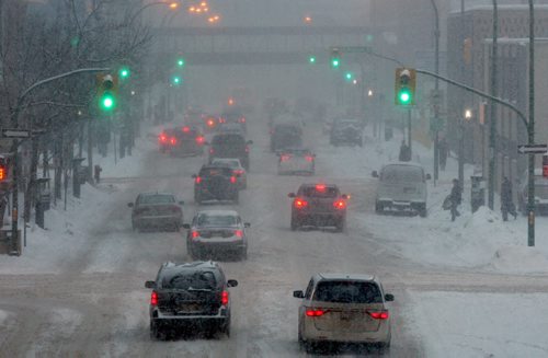 Blustery Day  Snow in Winnipeg this morning slowed down the commute  as seen on St Marys Ave near 830 PM- Standup Photo- Jan 27, 2016   (JOE BRYKSA / WINNIPEG FREE PRESS)