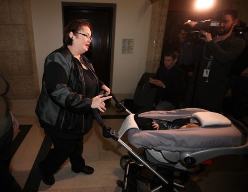 Fort Rouge MLA Jennifer Howard walks with her daughter,  8-month-old  Georgia, to NDP Caucus door prior to press conference announcing  Howard not seeking re-election and departure from the NDP party at the Leg Wednesday.  Howard's decision was based on wanting to spend more time with her family.      Jan 27, 2016 Ruth Bonneville / Winnipeg Free Press