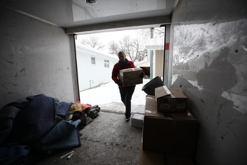 Professional Organizer Susan Macaulay, owner of  Clarity Over Clutter, organizes and and moves boxes of belongings from a homeowner relocating to another city for story for Ent story on decluttering.  See Erin Lebar's story.   Jan 27, 2016 Ruth Bonneville / Winnipeg Free Press