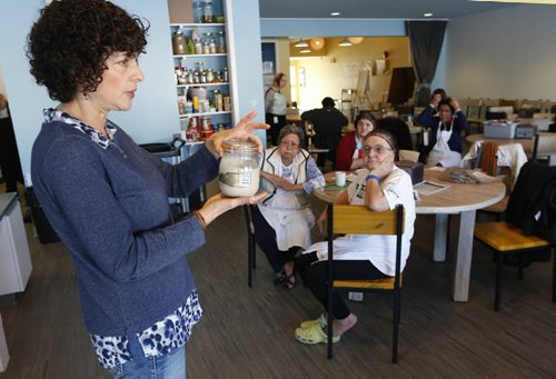 At left, traditional food teacher Wendy Erlanger with a jar of spelt sourdough starter, she is  teaching a sour dough workshop at the NorWest Co-op Community Food Centre Thursday.  The story is about healthy eating and access to food along with soaring rates of diabetes.  Kristin Annable story Wayne Glowacki / Winnipeg Free Press Jan. 28 2016