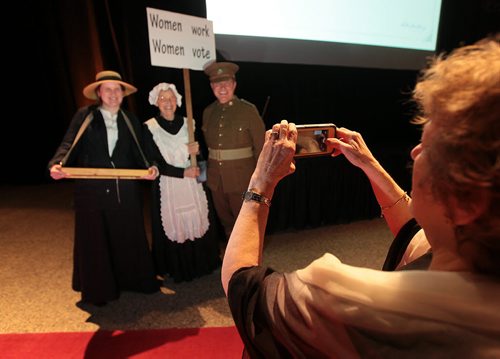 Reinactors dressed in period costumes met guests arriving at the Centennial Women's Gala, Celebrating 100 Years of Manitoba Women's Right to Vote. See Story. January 28, 2016 - (Phil Hossack / Winnipeg Free Press)