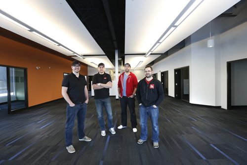 

Wayne Glowacki / Winnipeg Free Press 
Bold Innovation Group partners (from left) Yvan Boisjoli, Stefan Maynard, Jay Myers and Eric Boisjoli in the 4,000-square-foot atrium of their new building in the south end of the city. Martin Cash story Wayne Glowacki / Winnipeg Free Press Jan. 29 2016
