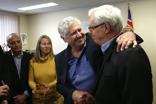 In centre, Gord Mackintosh, St. Johns MLA with Premier Greg Selinger at the  press conference at his constituency office Friday where Mackintosh announced he will not be seeking re-election. At left of Gord Mackintosh is his wife Margaret and  David Chomiak, Minister of Mineral Resources. Larry Kusch story Wayne Glowacki / Winnipeg Free Press Jan. 29 2016