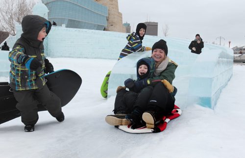 Tara Vanasse and six-year-old Lennon Caissy scream as they make their way down the castle slide while their family members watch at The Great Ice Show at the Forks Saturday. Standup photo  Jan 30, 2016 Ruth Bonneville / Winnipeg Free Press