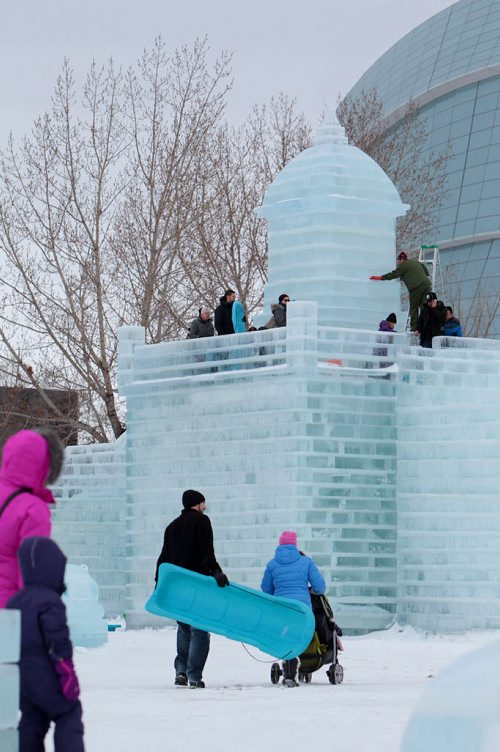 Kids and and families  toboggan down the great Ice Caste slide at The Great Ice Show at the Forks Saturday. Standup photo  Jan 30, 2016 Ruth Bonneville / Winnipeg Free Press