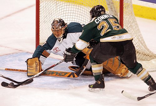 BORIS MINKEVICH / WINNIPEG FREE PRESS 080212 Manitoba Moose vs. Iowa Stars Moose goalie Drew MacIntyre stops Stars #25 Chris Conner.
