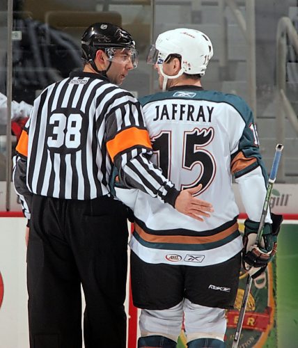 BORIS MINKEVICH / WINNIPEG FREE PRESS  080212 Manitoba Moose vs. Iowa Stars Referee Francois St. Laurant and Moose #15 Jason Jaffray get to chat before a face off.