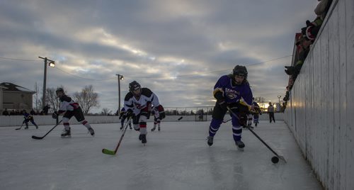 DAVID LIPNOWSKI / WINNIPEG FREE PRESS 160130  Winnipeg East Stars (wearing purple) competed against the Dakota Black during the 1st inaugural Winter Storm Female Classic at the Waverley Heights Site of the South Winnipeg community centre.  Twenty teams equaling over 300 female players between the ages of 7 and 10 from all over the city have registered to take part in the first annual Winter Storm Female Classic. The all-outdoor tourney will take place at the Waverley Heights Site of the South Winnipeg C.C. between January 25th  31st 2016.