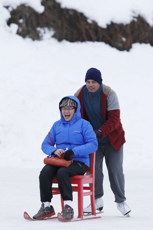 January 31, 2016 - 150914  -  Recent (Nov) immigrants from the Philippines Joe and Diana Casilla enjoy some winter fun at the Forks Sunday, January 31, 2016.  John Woods / Winnipeg Free Press