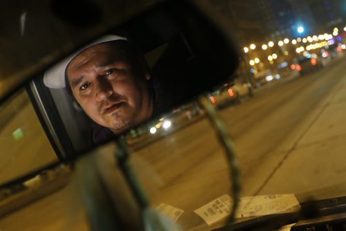 January 31, 2016 - 160131  - Pernell Flett, operator of Neechi Rides, a volunteer ride service he is operating by himself to help indigenous people get safe transportation is photographed in his van on Portage Avenue Sunday, January 31, 2016.  John Woods / Winnipeg Free Press