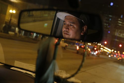 January 31, 2016 - 160131  - Pernell Flett, operator of Neechi Rides, a volunteer ride service he is operating by himself to help indigenous people get safe transportation is photographed in his van on Portage Avenue Sunday, January 31, 2016.  John Woods / Winnipeg Free Press