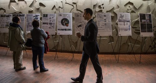 Office workers in the rotunda underneath Portage and Main take an opportunity to look at some of the architectural renderings on display.  160201 - Monday, February 1, 2016 -  MIKE DEAL / WINNIPEG FREE PRESS