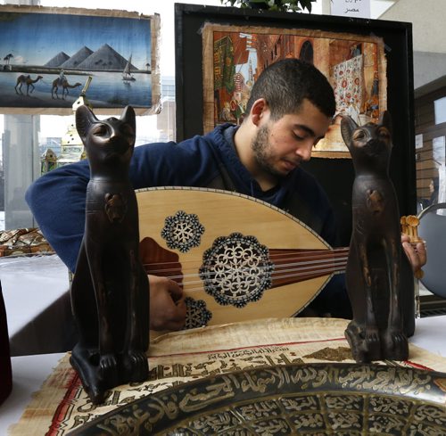 Ahmed Farag was setting up the display for the country of Egypt Tuesday in preparation for the Arab Cultural Exhibition on Wed. Feb 3 from 9:30 to 3 pm at the Marshall McLuhan Hall in the U of M  University Centre.  He is strumming on an intrument called a Oud. There will be Arabic calligraphers, Arabian horse experts, an Arab artist from Morocco and local Arab speakers from Syria and Palestine.Carol Sanders story Wayne Glowacki / Winnipeg Free Press Feb.2 2016