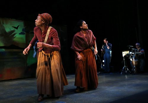 Actors Gabrielle Graham,left, and Reanna Joseph in a scene form The Power of Harriet T, a play about Harriet Tubmans life story. The musicians are Tom Keenan and Isaac Gutiwilik at far right. The play at the Manitoba Theatre for Young People is in celebration of Black History Month. Randall King story Wayne Glowacki / Winnipeg Free Press Feb.2 2016