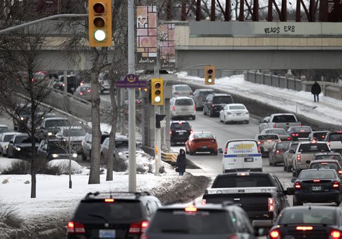 Traffic and traffic lights at Queen Elizabeth Way Tuesday. See story re: new traffic Light system for the city.....February 2, 2016 - (Phil Hossack / Winnipeg Free Press)