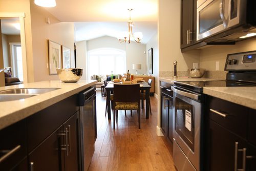TriWest Show Home at 516 Ferry Rd is example of a new home in older neighbourhood.  Great new home for infill housing.    Contact, Ken Smith.  Pre-fab home built off-site and placed onto foundation.    February 2, 2016 Ruth Bonneville / Winnipeg Free Press