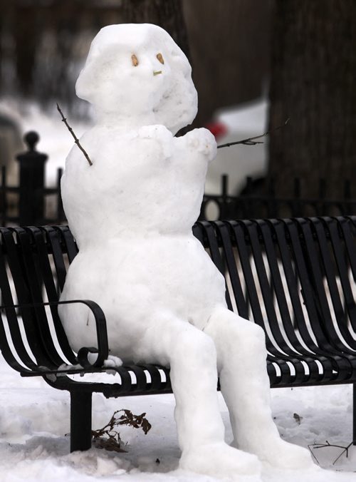 A snowman sits on a bench in Osborne Village Green Park on Stradbrook Ave Wednesday-Standup Photo- Feb 03, 2016   (JOE BRYKSA / WINNIPEG FREE PRESS)