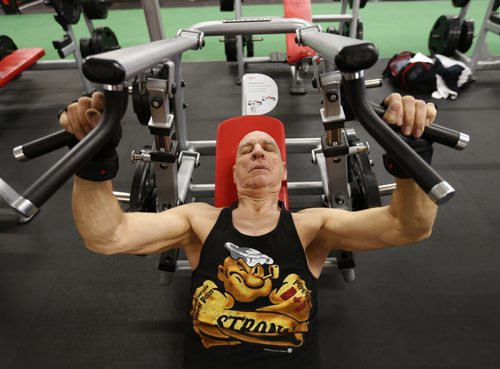 Steve Van Vlaenderen, a 67-year-old bodybuilder who only began working out roughly three years ago. He is working out on the cable-fly machine at McDoles Gym. He placed second in last years bodybuilding competition here in Manitoba in the Masters category. Scott Billeck story Wayne Glowacki / Winnipeg Free Press Feb.3 2016