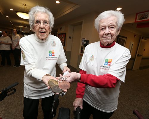 All Seniors Care Seniors Games Chefs de Mission Jean West (left) and Jean Sauder show off medals at Sturgeon Creek Retirement Residence on Feb. 1, 2016. Photo by Jason Halstead/Winnipeg Free Press RE: Social Page
