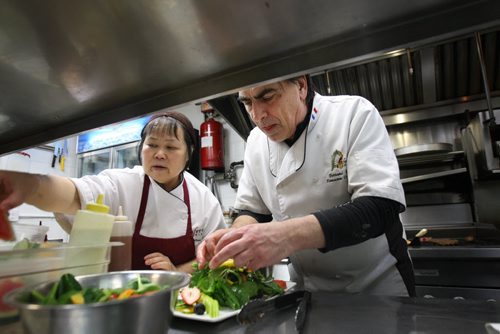 In Fernos Bistro- 312 Des Meurons St- Owner Fern Kirouac, right, busy in the kitchen with cook Missy Li  -See David Sanderson This City Feature  Feb 04, 2016   (JOE BRYKSA / WINNIPEG FREE PRESS)