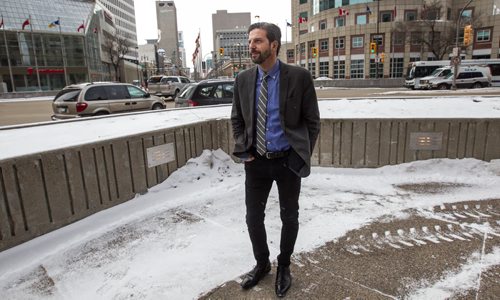 Tim Tompkins, president of the Times Square Alliance, takes a look at Winnipeg's famous Portage and Main intersection. 160204 - Thursday, February 4, 2016 -  MIKE DEAL / WINNIPEG FREE PRESS