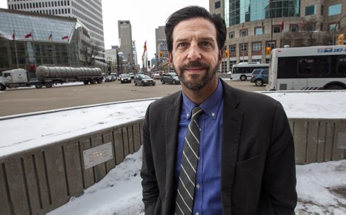 Tim Tompkins, president of the Times Square Alliance, takes a look at Winnipeg's famous Portage and Main intersection. 160204 - Thursday, February 4, 2016 -  MIKE DEAL / WINNIPEG FREE PRESS