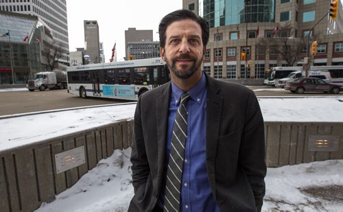 Tim Tompkins, president of the Times Square Alliance, takes a look at Winnipeg's famous Portage and Main intersection. 160204 - Thursday, February 4, 2016 -  MIKE DEAL / WINNIPEG FREE PRESS