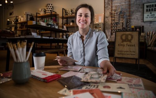 Danika Bock, part owner of Tiny Feast, a boutique stationary story in the Exchange District, has many different kinds of valentine cards. 160204 - Thursday, February 4, 2016 -  MIKE DEAL / WINNIPEG FREE PRESS