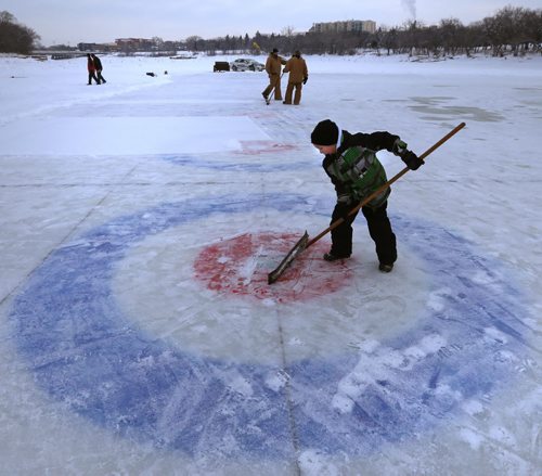 IRONBOY. Colby Henry,8, lends a hand on his day off from school (inservice) cleaning off the snow on one of the 10 curling rinks on the Red River near The Forks for this weekend's Annual Ironman Outdoor Curling Bonspiel. The opening ceremonies are at 4:30 P.M. Friday and through the weekend 80 teams  will enjoy the great outdoors with proceeds going to the Heart and Stroke Foundation of Manitoba.Wayne Glowacki / Winnipeg Free Press Feb.5 2016