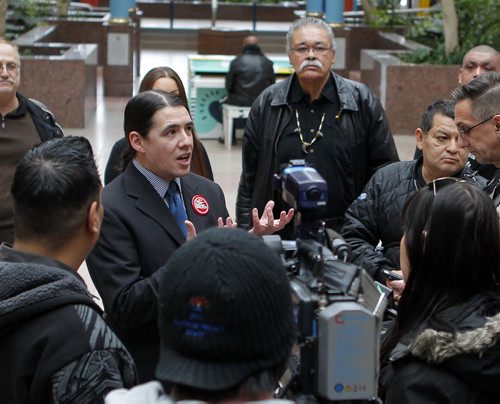 A public protest at Portage Place earlier over security guards who ordered a Dene elder to leave the mall is expected to be addressed by the local MP Friday afternoon. Winnipeg Centre MP Robert-Falcon Ouellette made a statement about "inclusive downtown spaces" in the Centre Court today. Joseph Meconse, 74, (in photo tall guy with moustache and wearing a bead necklace) was kicked out of the Portage Place Mall's food court for loitering last Friday. The Sayisi Dene elder, military veteran and Order of Manitoba recipient hasn't let the issue keep him away from his usual spot in the food court. BORIS MINKEVICH / WINNIPEG FREE PRESS February 5, 2016