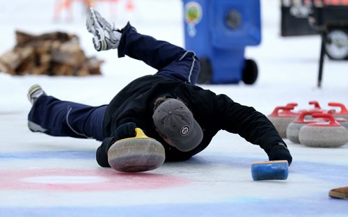 Doug Speirs participates in the media challenge prior to the Ironman Outdoor Curling Bonspiel at The Forks, Friday, February 5, 2016. (TREVOR HAGAN/WINNIPEG FREE PRESS)