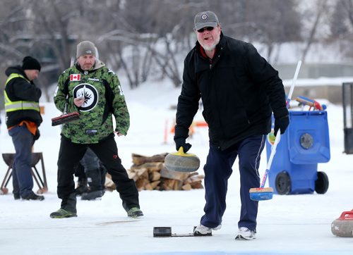 Doug Speirs participates in the media challenge prior to the Ironman Outdoor Curling Bonspiel at The Forks, Friday, February 5, 2016. (TREVOR HAGAN/WINNIPEG FREE PRESS)