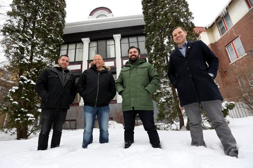Ryan Jones, Sean Kirady, Andre Silva and Eric Neumann, in front of a home that is being converted to condos at 260 Wellington Crescent, Friday, February 5, 2016. (TREVOR HAGAN/WINNIPEG FREE PRESS)