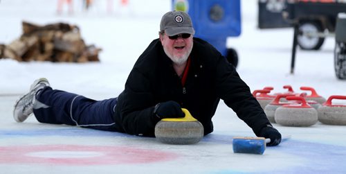 Doug Speirs participates in the media challenge prior to the Ironman Outdoor Curling Bonspiel at The Forks, Friday, February 5, 2016. (TREVOR HAGAN/WINNIPEG FREE PRESS)